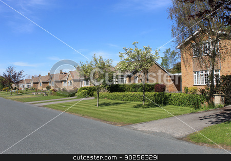 To use this stock image in your creative project, please select the size you need over to the right and click the "Add to Cart" button.
Your downloaded image will come with the Cutcaster watermark removed so don’t worry about the watermark you see on this page. Houses on English street stock photo, Row of houses and bungalows on English street in rural village. by Martin Crowdy