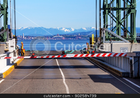 To use this stock image in your creative project, please select the size you need over to the right and click the "Add to Cart" button.
Your downloaded image will come with the Cutcaster watermark removed so don’t worry about the watermark you see on this page. Bainbridge Island Ferry Dock Gate Puget Sound Seattle Cascade Mo stock photo, Bainbridge Island Ferry Dock Gate Puget Sound Seattle Cascade Mountains in Distance Kitsap County Washington State Pacific Northwest by William Perry