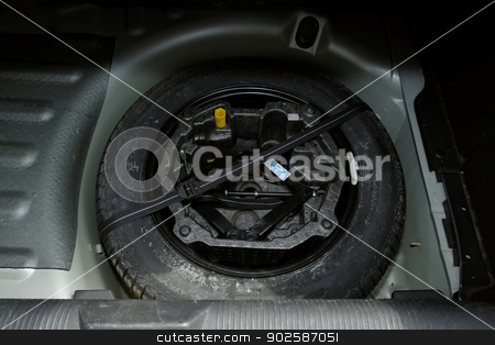 To use this stock image in your creative project, please select the size you need over to the right and click the "Add to Cart" button.
Your downloaded image will come with the Cutcaster watermark removed so don’t worry about the watermark you see on this page. car tire changign set stock photo, car lifter set for tire changing in the back of car by Jozsef Demeter