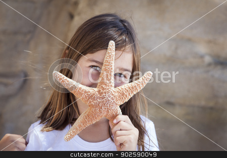 To use this stock image in your creative project, please select the size you need over to the right and click the "Add to Cart" button.
Your downloaded image will come with the Cutcaster watermark removed so don’t worry about the watermark you see on this page. Young Girl Playing with Starfish stock photo, Young Pretty Girl Playing with Starfish. by Andy Dean
