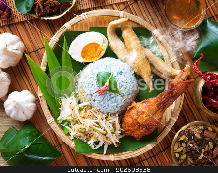 To use this stock image in your creative project, please select the size you need over to the right and click the "Add to Cart" button.
Your downloaded image will come with the Cutcaster watermark removed so don’t worry about the watermark you see on this page. Nasi kerabu stock photo, Nasi kerabu is a type of nasi ulam, popular Malay rice dish. Blue color of rice resulting from the petals of butterfly-pea flowers. Traditional Malaysian food, Asian cuisine. by szefei