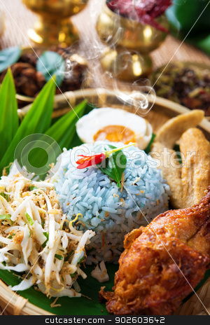 To use this stock image in your creative project, please select the size you need over to the right and click the "Add to Cart" button.
Your downloaded image will come with the Cutcaster watermark removed so don’t worry about the watermark you see on this page. Traditional Malaysian food nasi kerabu stock photo, Traditional Malaysian food. Nasi kerabu is a type of nasi ulam, popular Malay rice dish. Blue color of rice resulting from the petals of butterfly-pea flowers. Asian cuisine. by szefei