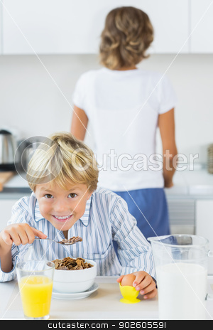 To use this stock image in your creative project, please select the size you need over to the right and click the "Add to Cart" button.
Your downloaded image will come with the Cutcaster watermark removed so don’t worry about the watermark you see on this page. Happy boy having breakfast stock photo, Happy boy having breakfast in kitchen by Wavebreak Media