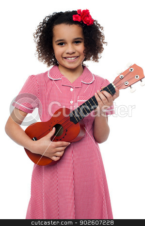 To use this stock image in your creative project, please select the size you need over to the right and click the "Add to Cart" button.
Your downloaded image will come with the Cutcaster watermark removed so don’t worry about the watermark you see on this page. A little girl with a toy guitar stock photo, Pretty girl kid loves music. Holding toy guitar in hand by Ishay Botbol