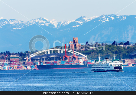 To use this stock image in your creative project, please select the size you need over to the right and click the "Add to Cart" button.
Your downloaded image will come with the Cutcaster watermark removed so don’t worry about the watermark you see on this page. Seattle Washington Port Ferry Stadium with Cranes and Freighters stock photo, Seattle Washington Port Ferry with Cranes Containers and Freighters Ships at Pier to Be Unloaded and Stadium Cascade Mountains by William Perry