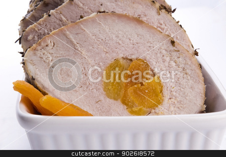 To use this stock image in your creative project, please select the size you need over to the right and click the "Add to Cart" button.
Your downloaded image will come with the Cutcaster watermark removed so don’t worry about the watermark you see on this page. Roasted pork loin with dried apricots stock photo, Roasted pork loin with dried apricots by sierpniowka