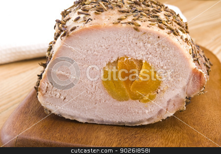 To use this stock image in your creative project, please select the size you need over to the right and click the "Add to Cart" button.
Your downloaded image will come with the Cutcaster watermark removed so don’t worry about the watermark you see on this page. Roasted pork loin with dried apricots stock photo, Roasted pork loin with dried apricots by sierpniowka