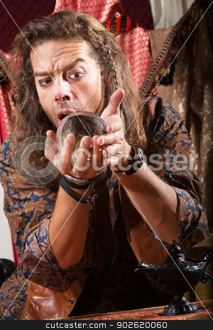 To use this stock image in your creative project, please select the size you need over to the right and click the "Add to Cart" button.
Your downloaded image will come with the Cutcaster watermark removed so don’t worry about the watermark you see on this page. Gypsy Man with Crystal Ball stock photo, Surprised man holding crystal ball close to his face by Scott Griessel