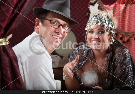 To use this stock image in your creative project, please select the size you need over to the right and click the "Add to Cart" button.
Your downloaded image will come with the Cutcaster watermark removed so don’t worry about the watermark you see on this page. Smiling Fortune Customer stock photo, Happy gypsy fortune teller and man with glowing crystal ball by Scott Griessel