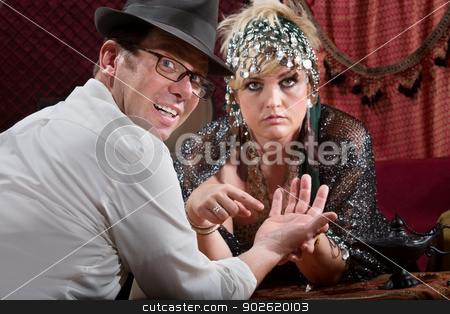 To use this stock image in your creative project, please select the size you need over to the right and click the "Add to Cart" button.
Your downloaded image will come with the Cutcaster watermark removed so don’t worry about the watermark you see on this page. Scared Man with Evil Eye stock photo, Scared man with fortune teller and evil eye symbol in palm by Scott Griessel