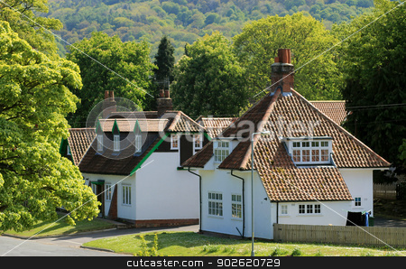To use this stock image in your creative project, please select the size you need over to the right and click the "Add to Cart" button.
Your downloaded image will come with the Cutcaster watermark removed so don’t worry about the watermark you see on this page. Houses in English village stock photo, White houses in English village with forest in background, Scalby, North Yorkshire, England. by Martin Crowdy