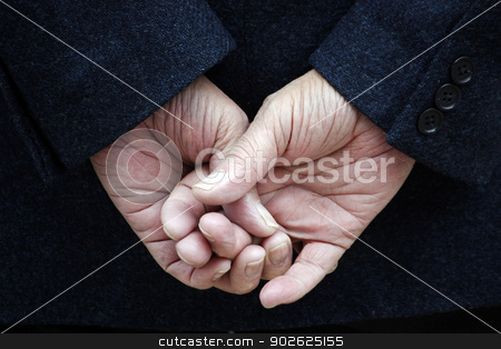 To use this stock image in your creative project, please select the size you need over to the right and click the "Add to Cart" button.
Your downloaded image will come with the Cutcaster watermark removed so don’t worry about the watermark you see on this page. crossed fingers stock photo, Dark blue jacket and two hands with crossed fingers. by Mauro Rodrigues