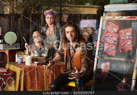 To use this stock image in your creative project, please select the size you need over to the right and click the "Add to Cart" button.
Your downloaded image will come with the Cutcaster watermark removed so don’t worry about the watermark you see on this page. Angry Man with Fortune Tellers stock photo, Angry man at table with female fortune tellers by Scott Griessel