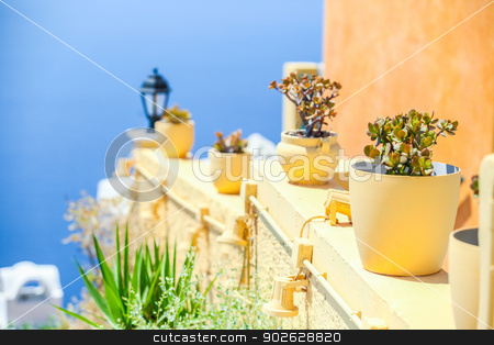 To use this stock image in your creative project, please select the size you need over to the right and click the "Add to Cart" button.
Your downloaded image will come with the Cutcaster watermark removed so don’t worry about the watermark you see on this page. Traditional greek details: colorful flowers with pots, lantern and caldera sea in background stock photo, Traditional greek details: colorful flowers with pots, lantern and caldera sea in background by Dmitry Travnikov
