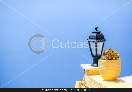 To use this stock image in your creative project, please select the size you need over to the right and click the "Add to Cart" button.
Your downloaded image will come with the Cutcaster watermark removed so don’t worry about the watermark you see on this page. Traditional greek details: colorful flowers with pots, lantern and caldera sea in background stock photo, Traditional greek details: colorful flowers with pots, lantern and caldera sea in background by Dmitry Travnikov