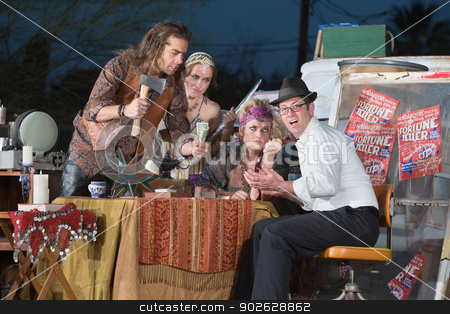 To use this stock image in your creative project, please select the size you need over to the right and click the "Add to Cart" button.
Your downloaded image will come with the Cutcaster watermark removed so don’t worry about the watermark you see on this page. Fortune Teller Threatening Businessman stock photo, Businessman threatened by angry fortune tellers at table by Scott Griessel