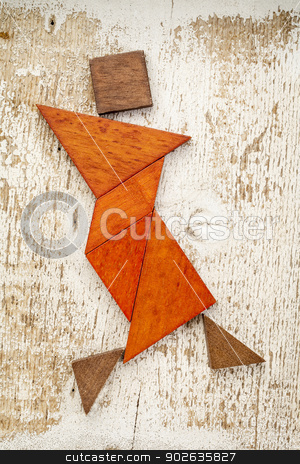 To use this stock image in your creative project, please select the size you need over to the right and click the "Add to Cart" button.
Your downloaded image will come with the Cutcaster watermark removed so don’t worry about the watermark you see on this page. tangram dancer figure stock photo, abstract figure of a female dancer built from seven tangram wooden pieces, a traditional Chinese puzzle game; rough white painted barn wood background by Marek Uliasz