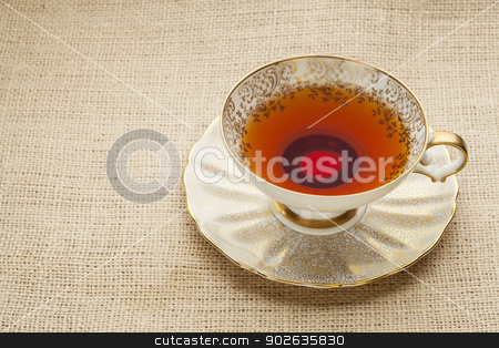 To use this stock image in your creative project, please select the size you need over to the right and click the "Add to Cart" button.
Your downloaded image will come with the Cutcaster watermark removed so don’t worry about the watermark you see on this page. antique cup of tea stock photo, afternoon tea - antique cup of black tea on canvas (burlap)background by Marek Uliasz