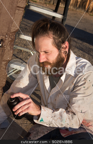 To use this stock image in your creative project, please select the size you need over to the right and click the "Add to Cart" button.
Your downloaded image will come with the Cutcaster watermark removed so don’t worry about the watermark you see on this page. Spray Paint Artist stock photo, Serious aresol artist spraying paint on wall by Scott Griessel