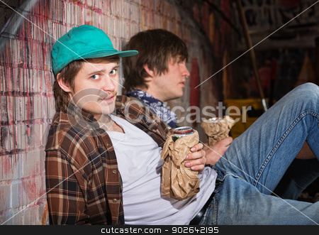 To use this stock image in your creative project, please select the size you need over to the right and click the "Add to Cart" button.
Your downloaded image will come with the Cutcaster watermark removed so don’t worry about the watermark you see on this page. Drunk Young Men stock photo, Two drunk young European men sitting outside by Scott Griessel