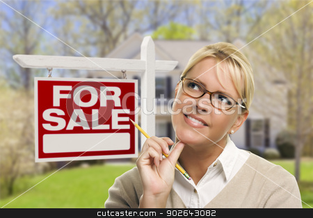 To use this stock image in your creative project, please select the size you need over to the right and click the "Add to Cart" button.
Your downloaded image will come with the Cutcaster watermark removed so don’t worry about the watermark you see on this page. Young Woman in Front of Sold Sign and House stock photo, Attractive Young Adult Woman with Pencil in Front of For Sale Real Estate Sign and House. by Andy Dean