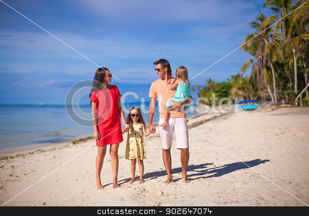 To use this stock image in your creative project, please select the size you need over to the right and click the "Add to Cart" button.
Your downloaded image will come with the Cutcaster watermark removed so don’t worry about the watermark you see on this page. Young beautiful family of four enjoyed relaxing on the beach stock photo, Young beautiful family of four enjoyed relaxing on the beach by Dmitry Travnikov