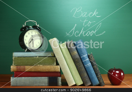 To use this stock image in your creative project, please select the size you need over to the right and click the "Add to Cart" button.
Your downloaded image will come with the Cutcaster watermark removed so don’t worry about the watermark you see on this page. School Books, Apple and Clock on Desk at School stock photo, Back to School Books, Apple and Clock on Desk by Katrina Brown