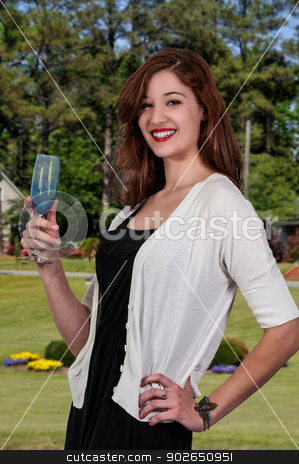 To use this stock image in your creative project, please select the size you need over to the right and click the "Add to Cart" button.
Your downloaded image will come with the Cutcaster watermark removed so don’t worry about the watermark you see on this page. Woman with Wine stock photo, Beautiful woman holding a glass of wine by Robert Byron
