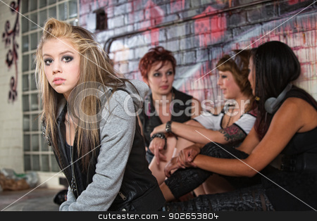 To use this stock image in your creative project, please select the size you need over to the right and click the "Add to Cart" button.
Your downloaded image will come with the Cutcaster watermark removed so don’t worry about the watermark you see on this page. Depressed Teen with Friends stock photo, Teenager with low self-esteem near three friends by Scott Griessel