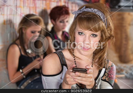 To use this stock image in your creative project, please select the size you need over to the right and click the "Add to Cart" button.
Your downloaded image will come with the Cutcaster watermark removed so don’t worry about the watermark you see on this page. Grinning Teen with Cellphone stock photo, Grinning young urban teenager holding a phone by Scott Griessel