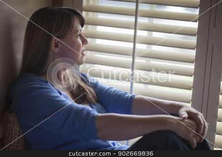 To use this stock image in your creative project, please select the size you need over to the right and click the "Add to Cart" button.
Your downloaded image will come with the Cutcaster watermark removed so don’t worry about the watermark you see on this page. Pensive Woman Sitting Near Window Shades stock photo, Pensive Woman Calmly Sitting Near Window Shades. by Andy Dean