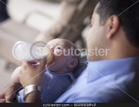 To use this stock image in your creative project, please select the size you need over to the right and click the "Add to Cart" button.
Your downloaded image will come with the Cutcaster watermark removed so don’t worry about the watermark you see on this page. Happy Hispanic Father Bottle Feeding His Mixed Race Son stock photo, Happy Hispanic Father Bottle Feeding His Very Content Mixed Race Son. by Andy Dean