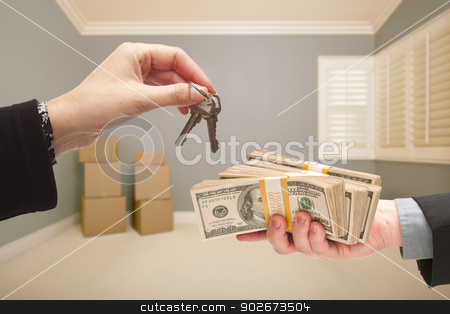 To use this stock image in your creative project, please select the size you need over to the right and click the "Add to Cart" button.
Your downloaded image will come with the Cutcaster watermark removed so don’t worry about the watermark you see on this page. Handing Over Cash For House Keys stock photo, Man and Woman Handing Over Cash For House Keys Inside Empty Gray Room with Boxes. by Andy Dean