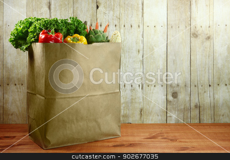Bag Of Grocery Produce Items On A Wooden Plank Stock Photo