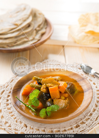 To use this stock image in your creative project, please select the size you need over to the right and click the "Add to Cart" button.
Your downloaded image will come with the Cutcaster watermark removed so don’t worry about the watermark you see on this page. Vegetable curry dhal stock photo, Vegetable curry dhal, chapatti roti or Flat bread and papadom. Indian food on dining table. by szefei