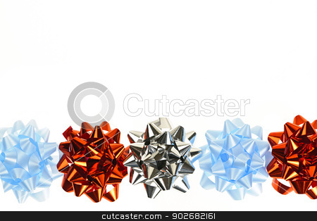 To use this stock image in your creative project, please select the size you need over to the right and click the "Add to Cart" button.
Your downloaded image will come with the Cutcaster watermark removed so don’t worry about the watermark you see on this page. Gift wrapping bows border stock photo, Row of multicolored gift wrapping bows isolated on white background by Elena Elisseeva