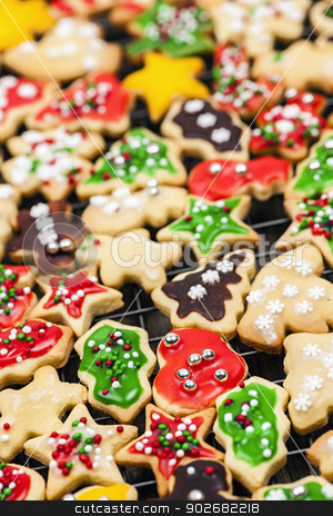 To use this stock image in your creative project, please select the size you need over to the right and click the "Add to Cart" button.
Your downloaded image will come with the Cutcaster watermark removed so don’t worry about the watermark you see on this page. Homemade Christmas cookies stock photo, Freshly baked homemade shortbread Christmas cookies on cooling rack by Elena Elisseeva
