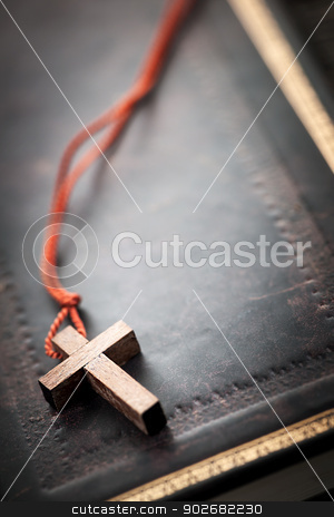 To use this stock image in your creative project, please select the size you need over to the right and click the "Add to Cart" button.
Your downloaded image will come with the Cutcaster watermark removed so don’t worry about the watermark you see on this page. Christian Cross on Bible stock photo, Closeup of simple wooden Christian cross necklace on holy Bible with copy space by Elena Elisseeva