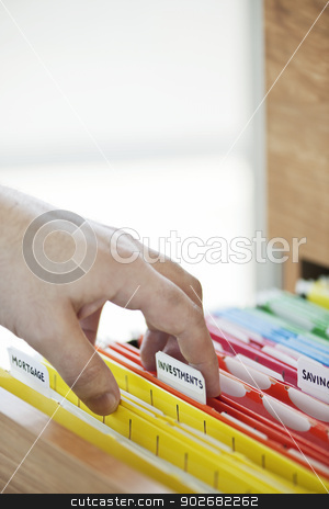 To use this stock image in your creative project, please select the size you need over to the right and click the "Add to Cart" button.
Your downloaded image will come with the Cutcaster watermark removed so don’t worry about the watermark you see on this page. Financial documents in folders stock photo, Hand searching through file folders with personal finance documents by Elena Elisseeva