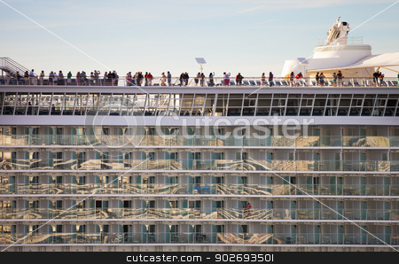 To use this stock image in your creative project, please select the size you need over to the right and click the "Add to Cart" button.
Your downloaded image will come with the Cutcaster watermark removed so don’t worry about the watermark you see on this page. Cruise ship balconies stock photo, Cruise ship balconies with vacationers on deck by Scott Griessel