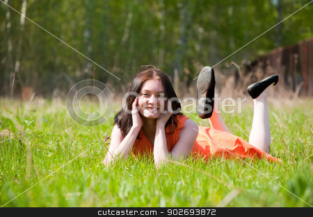 To use this stock image in your creative project, please select the size you need over to the right and click the "Add to Cart" button.
Your downloaded image will come with the Cutcaster watermark removed so don’t worry about the watermark you see on this page. Pretty girl laying on grass stock photo, Young beautiful woman in orange dress laying on grass by Aikon