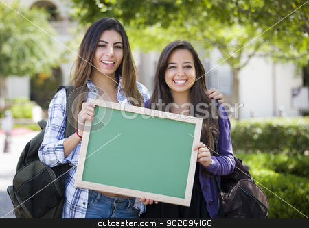 To use this stock image in your creative project, please select the size you need over to the right and click the "Add to Cart" button.
Your downloaded image will come with the Cutcaster watermark removed so don’t worry about the watermark you see on this page. Mixed Race Female Students Holding Blank Chalkboard stock photo, Portrait of Two Attractive Mixed Race Female Students Holding Blank Chalkboard and Carrying Backpacks on School Campus. by Andy Dean