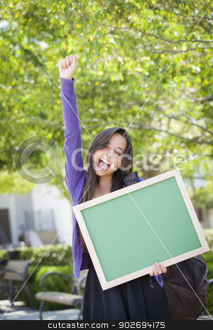 To use this stock image in your creative project, please select the size you need over to the right and click the "Add to Cart" button.
Your downloaded image will come with the Cutcaster watermark removed so don’t worry about the watermark you see on this page. Excited Mixed Race Female Student Holding Blank Chalkboard stock photo, Portrait of An Attractive Excited Mixed Race Female Student Holding Blank Chalkboard and Carrying Backpack on School Campus. by Andy Dean