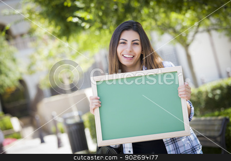 To use this stock image in your creative project, please select the size you need over to the right and click the "Add to Cart" button.
Your downloaded image will come with the Cutcaster watermark removed so don’t worry about the watermark you see on this page. Excited Mixed Race Female Student Holding Blank Chalkboard stock photo, Portrait of An Attractive Excited Mixed Race Female Student Holding Blank Chalkboard and Carrying Backpack on School Campus. by Andy Dean