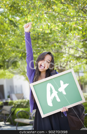 To use this stock image in your creative project, please select the size you need over to the right and click the "Add to Cart" button.
Your downloaded image will come with the Cutcaster watermark removed so don’t worry about the watermark you see on this page. Mixed Race Female Student Holding Chalkboard With A+ Written stock photo, Excited Mixed Race Female Student Holding a Chalkboard With A+ Written on it. by Andy Dean