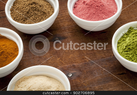 To use this stock image in your creative project, please select the size you need over to the right and click the "Add to Cart" button.
Your downloaded image will come with the Cutcaster watermark removed so don’t worry about the watermark you see on this page. super fruit and leaf powders stock photo, super fruit and leaf powders in small ceramic bowls with copy space - baobab, nori, yumberry, moringa, mangosteen by Marek Uliasz