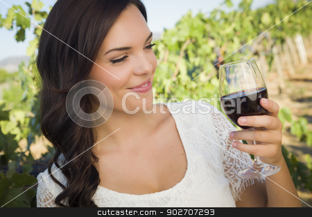 To use this stock image in your creative project, please select the size you need over to the right and click the "Add to Cart" button.
Your downloaded image will come with the Cutcaster watermark removed so don’t worry about the watermark you see on this page. Young Adult Woman Enjoying A Glass of Wine in Vineyard stock photo, Pretty Mixed Race Young Adult Woman Enjoying A Glass of Wine in the Vineyard. by Andy Dean