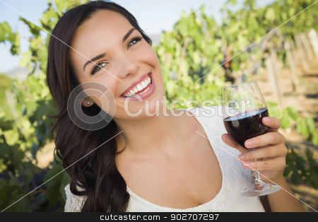 To use this stock image in your creative project, please select the size you need over to the right and click the "Add to Cart" button.
Your downloaded image will come with the Cutcaster watermark removed so don’t worry about the watermark you see on this page. Young Adult Woman Enjoying A Glass of Wine in Vineyard stock photo, Pretty Mixed Race Young Adult Woman Enjoying A Glass of Wine in the Vineyard. by Andy Dean