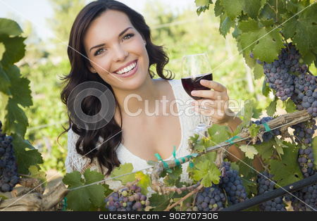 To use this stock image in your creative project, please select the size you need over to the right and click the "Add to Cart" button.
Your downloaded image will come with the Cutcaster watermark removed so don’t worry about the watermark you see on this page. Young Adult Woman Enjoying A Glass of Wine in Vineyard stock photo, Pretty Mixed Race Young Adult Woman Enjoying A Glass of Wine in the Vineyard. by Andy Dean