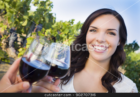 To use this stock image in your creative project, please select the size you need over to the right and click the "Add to Cart" button.
Your downloaded image will come with the Cutcaster watermark removed so don’t worry about the watermark you see on this page. Young Woman Enjoying Glass of Wine in Vineyard With Friends stock photo, Pretty Mixed Race Young Adult Woman Enjoying A Glass of Wine in the Vineyard with Friends. by Andy Dean